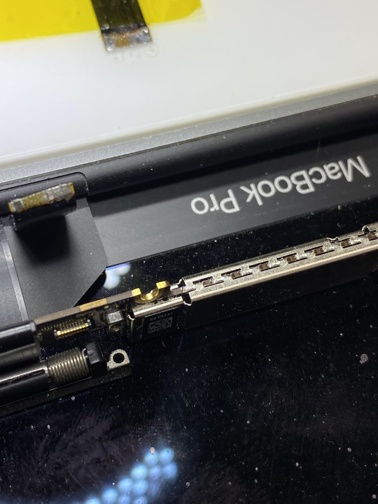 Component-level trackpad repair on the MackTechs bench